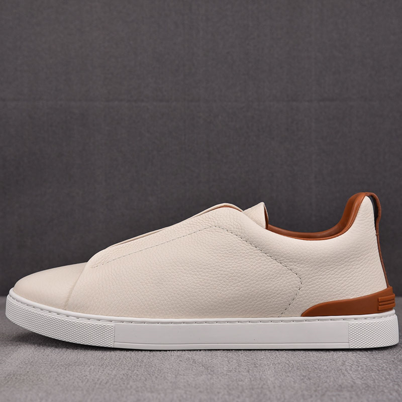 제냐 오프화이트 디어스킨 트리플 스티치 스니커즈