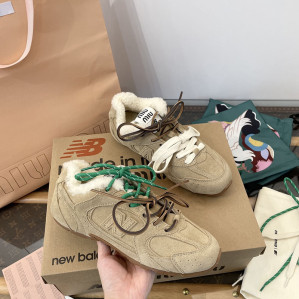 뉴발란스 x 미우미우 530 SL 블리치드 가죽 스니커즈